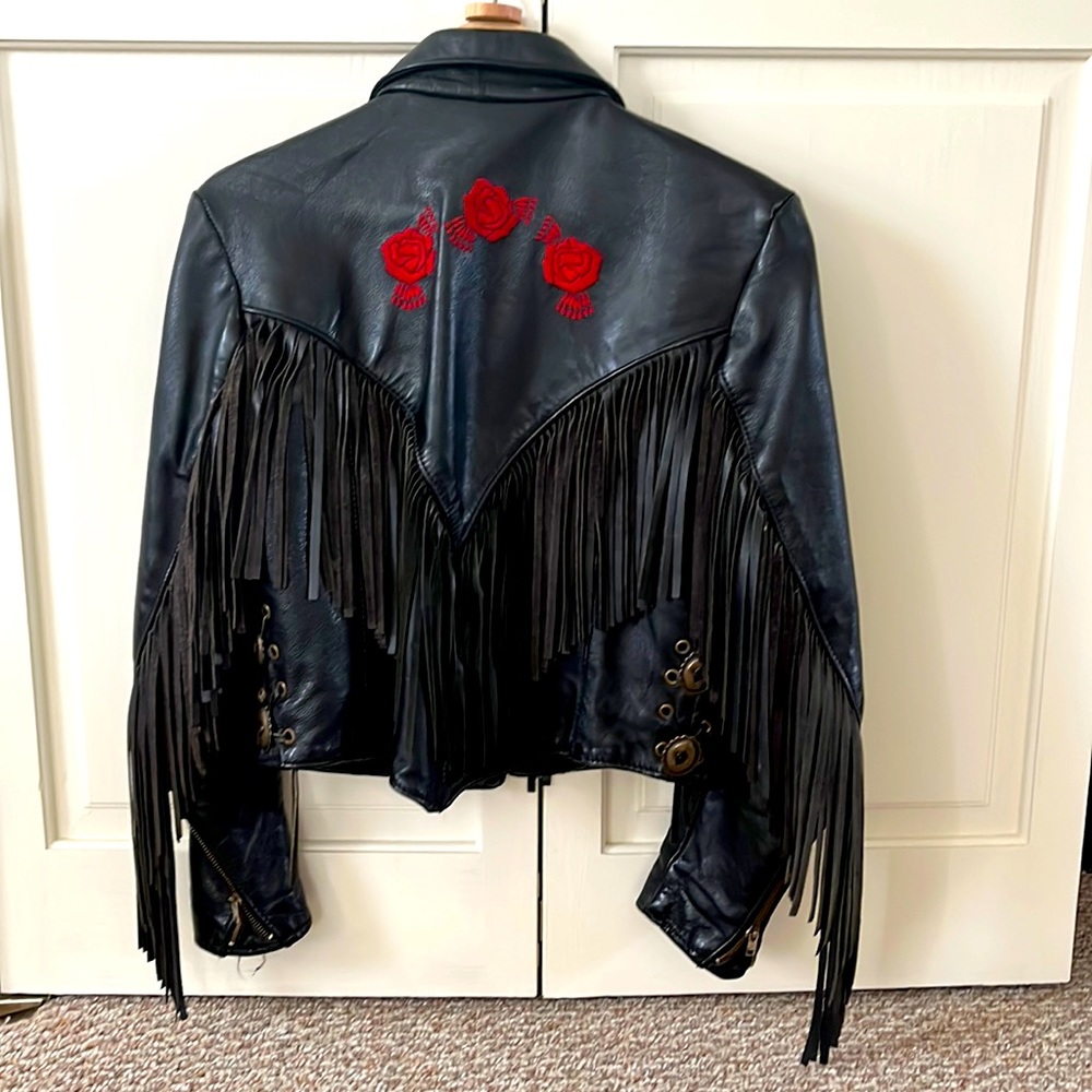 One of a kind leather fringe embroidered moto jacket.